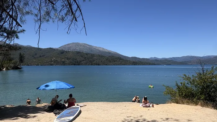 Whiskeytown Lake swim beach and clear water on a summer afternoon