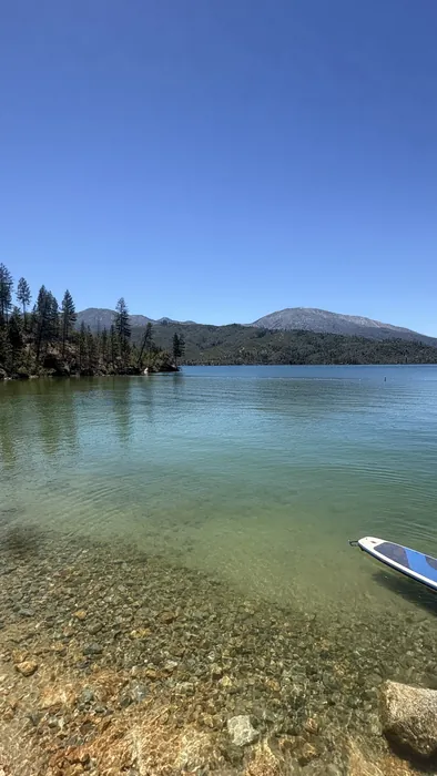 Clear, shallow water and the far ridgeline at Whiskeytown Lake