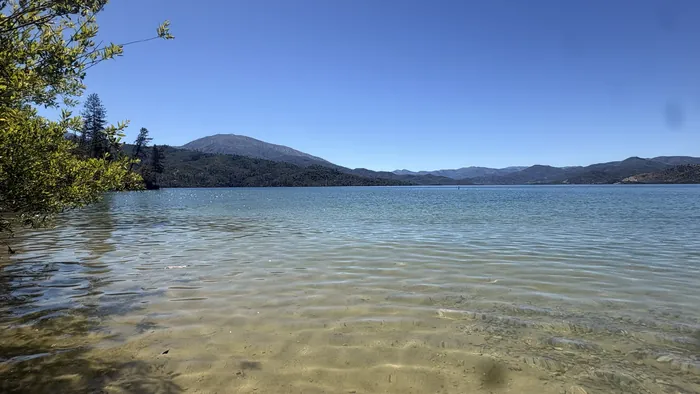 Clear water and the mountains across the Whiskeytown Lake basin
