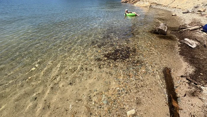 Smooth rocks under shallow, clear water at Whiskeytown Lake