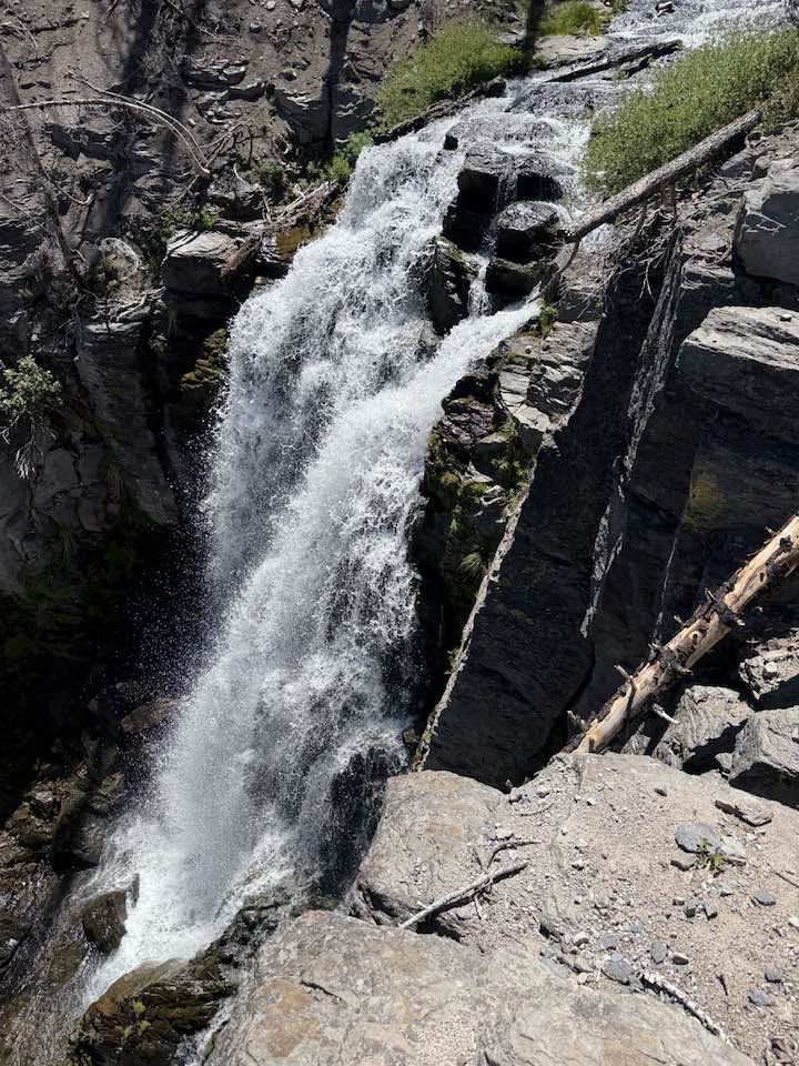 Kings Creek Falls cascading down volcanic rock on early-summer snowmelt in Lassen Volcanic National Park